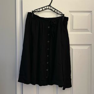 Button from skirt with tie